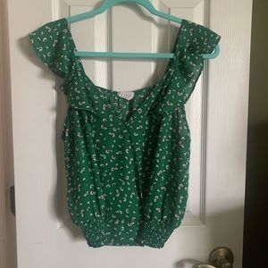 Green floral top.